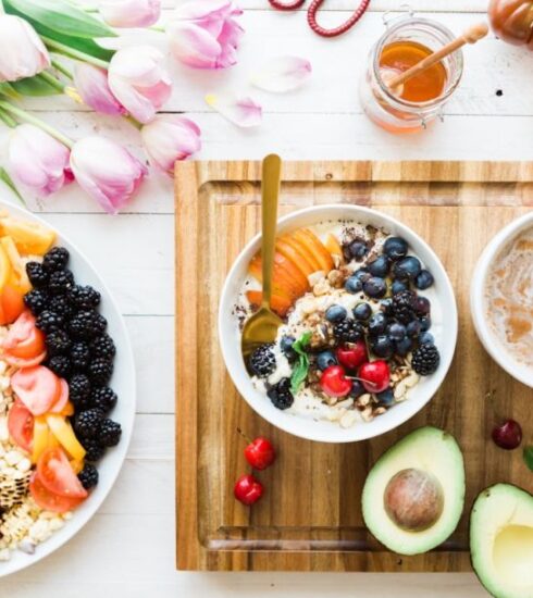 Nutrition - black and red cherries on white bowl