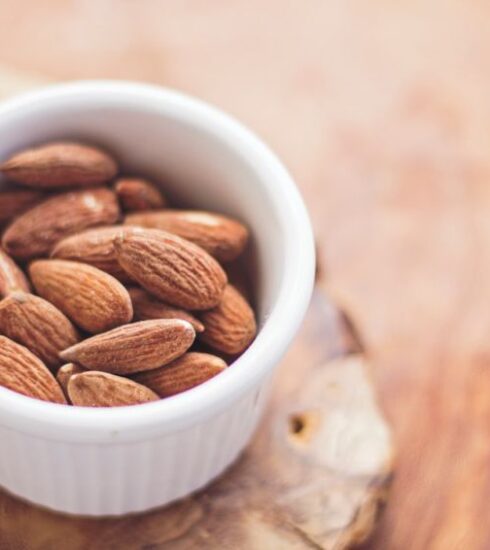 Nutrition Supplements - shallow focus photography of almonds in white ceramic bowl