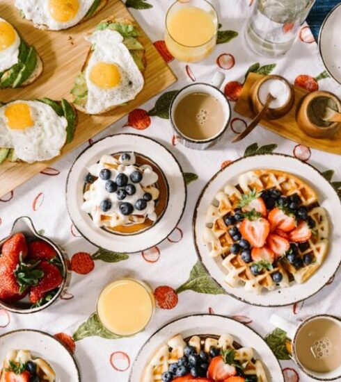 Breakfast - round white ceramic plate filled with waffle