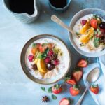 Nutrition - two bowls of oatmeal with fruits