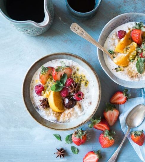 Nutrition - two bowls of oatmeal with fruits