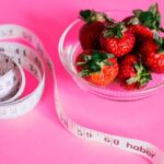 Diet - Strawberries And Measuring Tape