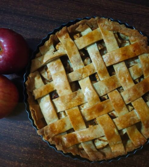 Foods - red apple beside brown pie