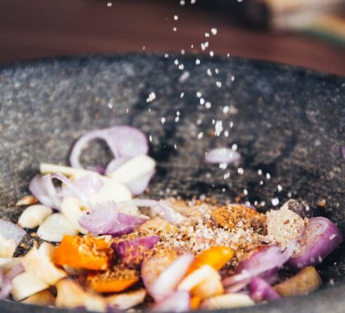 Cooking - Person Pouring Salt in Bowl