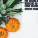 Diet - Pumpkins and Pineapple Next to Laptop