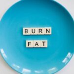 Diet - Photo of a Burn Fat Text on Round Blue Plate