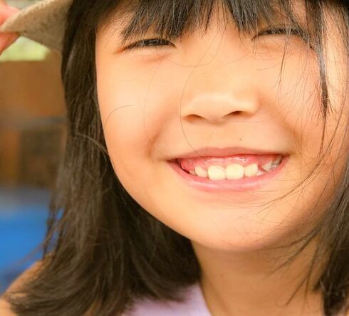 Foods - A little girl wearing a hat with a butterfly on it