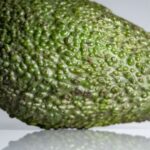 Superfoods - An avocado is shown on a white background