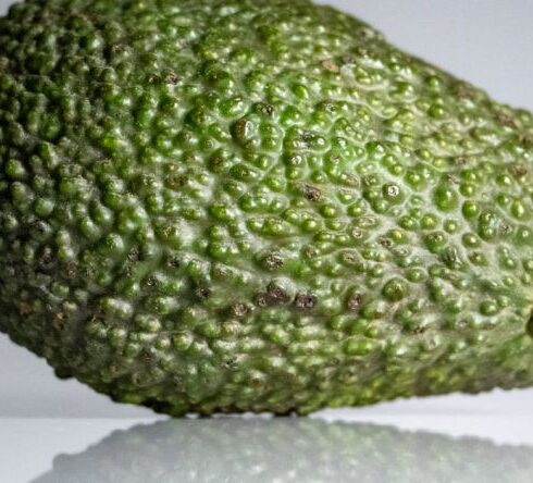 Superfoods - An avocado is shown on a white background