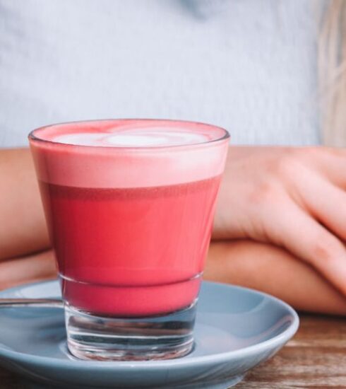 Superfoods - woman in front of drink and saucer