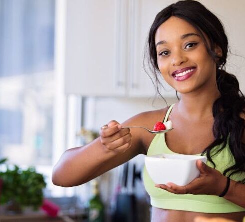 Healthy Eating - Woman Holding Gray Steel Spoon