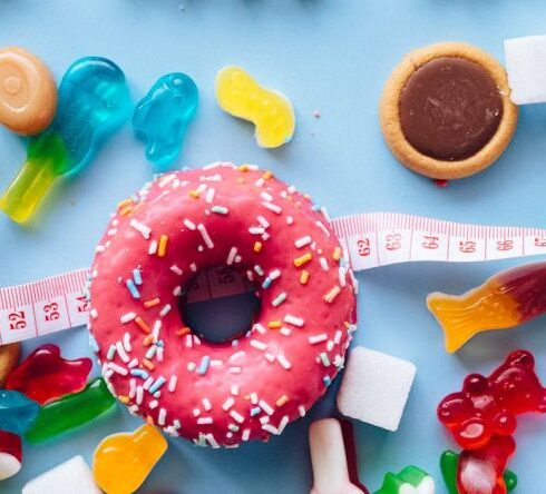 Diets - Pink and White Doughnut With Sprinkles