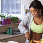 Healthy Eating - Woman Slicing Gourd