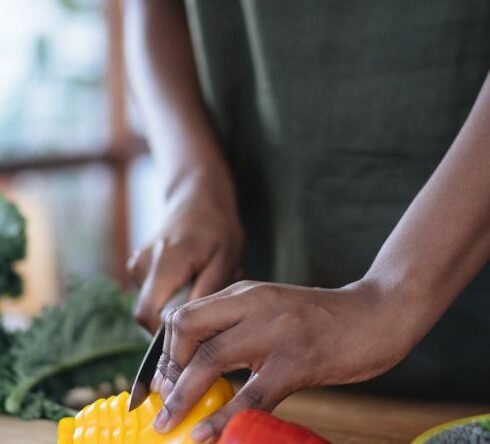 Healthy Eating - Photo Of Person Cutting Bell Peppers