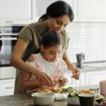 Healthy Eating - Mother and Daughter Preparing Avocado Toast