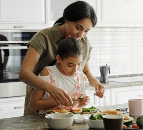 Healthy Eating - Mother and Daughter Preparing Avocado Toast