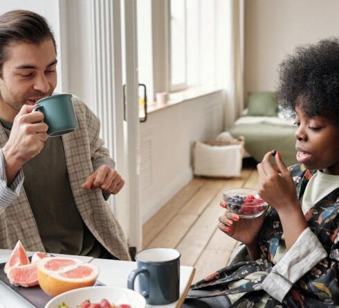 Healthy Eating - Man And Woman Having Breakfast