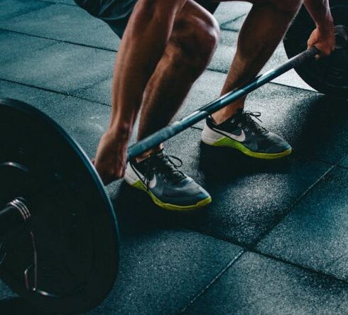 Weightlifting - Person Holding Barbell