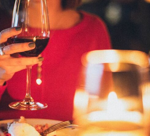 Dinner - Woman Holding Wine Glass Selective Focus Photography