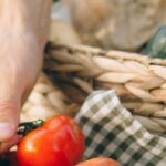 Healthy Eating - Person Holding Red Tomato Fruit