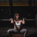 Weightlifting - Woman Lifting Barbell