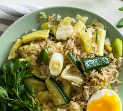 Diet - Rice With Zucchini, Soft Boiled Egg, and Parsley in Green Ceramic Plate