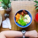 Nutrition - Woman Holding Iphone While Eating