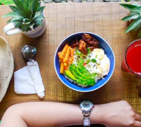 Nutrition - Woman Holding Iphone While Eating