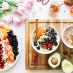 Nutrition - black and red cherries on white bowl