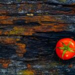 Foods - red tomato on brown log