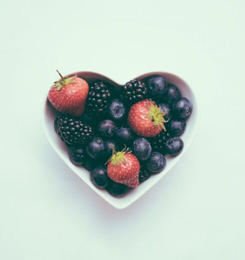 Nutrition - heart-shaped bowl with strawberries