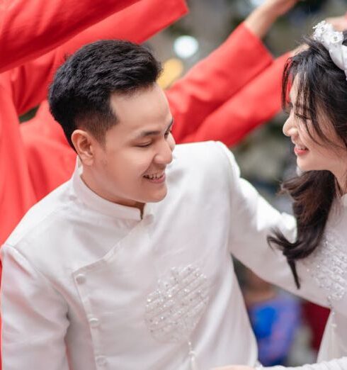 Tunics - Newlywed Passing Under the Tunnel of Wedding Guests Arms