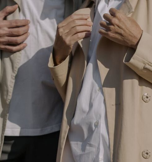 Overcoats - Man and Woman in Beige Coats