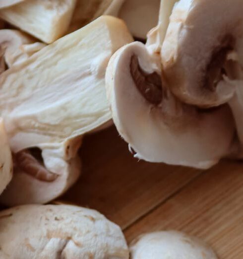 Healthy Eating - Mushrooms are cut into pieces on a cutting board