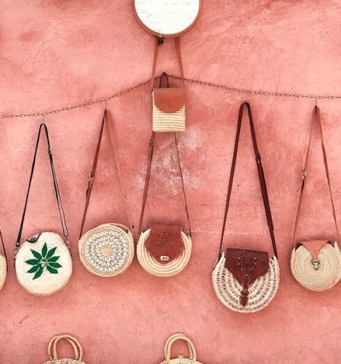 Bags - Photo Of Wicker Bags And Straw Hats On A Pink Wall