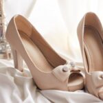 Footwear - Pair of Beige Leather Open-toe Heeled Platform Shoes on White Textile