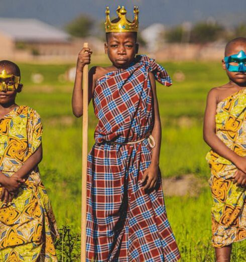 Tunics - Young Boys Wearing Patterned Tunics and Face Masks