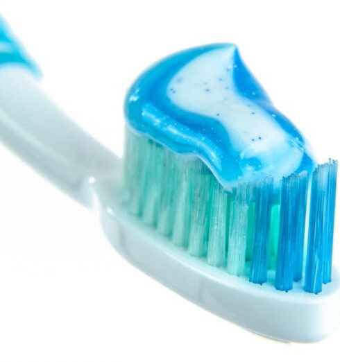 Routine - Blue and White Toothpaste on Toothbrush