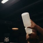 Goal Setting - Topless Man Holding White Plastic Cup