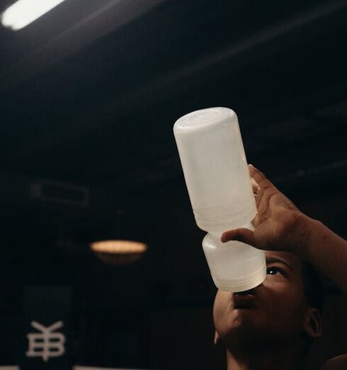 Goal Setting - Topless Man Holding White Plastic Cup