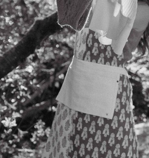 Tasks - Grayscale Photo of a Woman Hanging Clothes