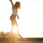 Balance - Woman Walking On Fence