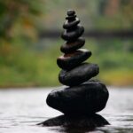 Balance - Black Stackable Stone Decor at the Body of Water