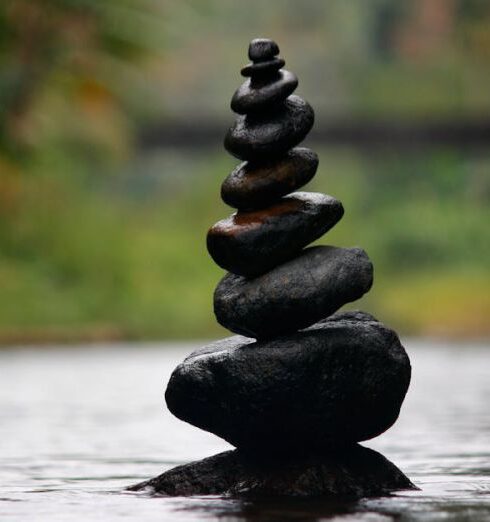 Balance - Black Stackable Stone Decor at the Body of Water