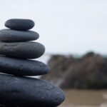 Balance - Photo of Stacked Rocks Near Shore