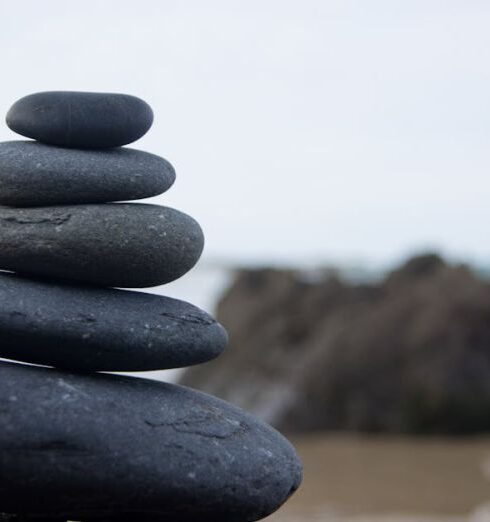 Balance - Photo of Stacked Rocks Near Shore