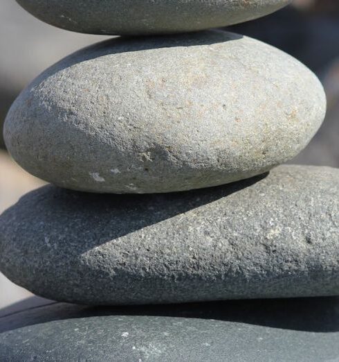 Balance - Close-up Photography of Gray Cairn Stone