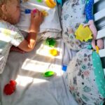 Time Blocking - Girl Sleeping with Toys in Crib