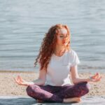 Discipline - Woman Doing Yoga Exercise At The Sea Shore