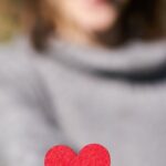 Compassion - Macro Shot Of Heart Shaped Cut Out